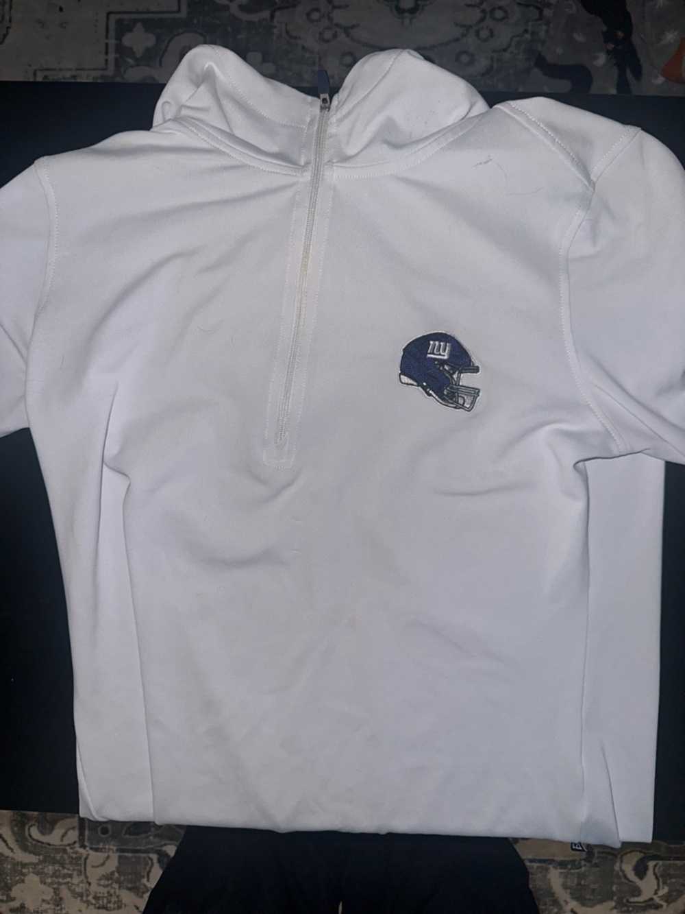 Women’s New York Giants Cutter & Buck White 1/4 sleeve pullover with hood.